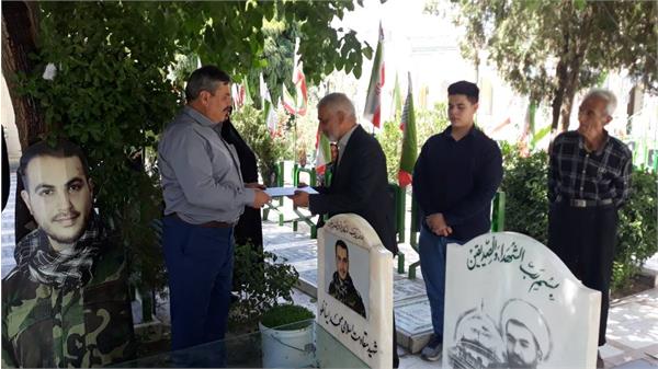 مراسم غبار روبی و عطر افشانی مزار مطهر شهیدجبهه مقاومت و مدافع حرم محمد اینانلو